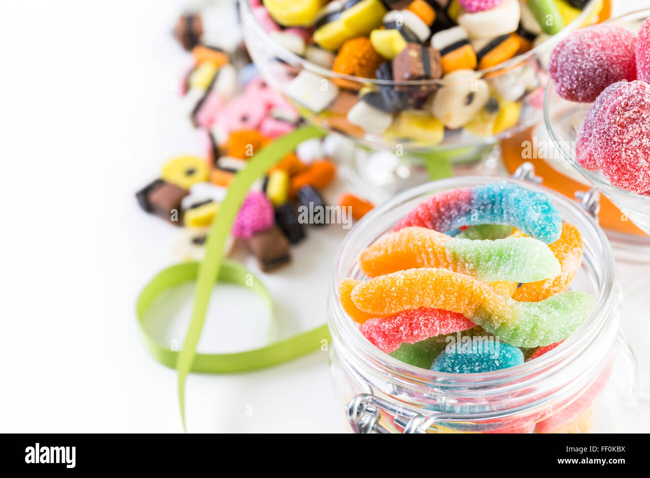 Variery of colorful candies on a white background Stock Photo - Alamy