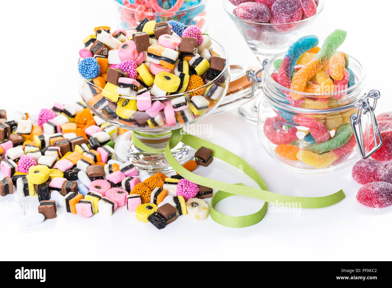 Variery of colorful candies on a white background Stock Photo - Alamy