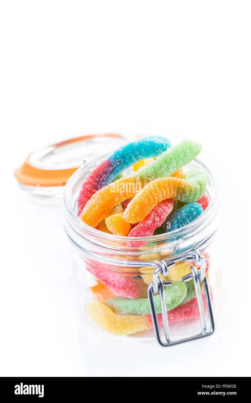 Candies in candy jar on a white background Stock Photo - Alamy