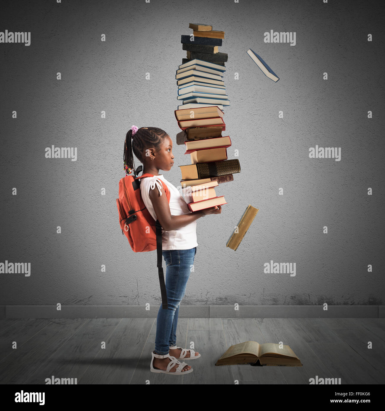 Pile of books for a little girl Stock Photo - Alamy