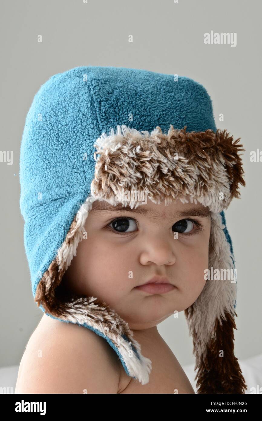 10 month baby girl wearing a winter hat Stock Photo