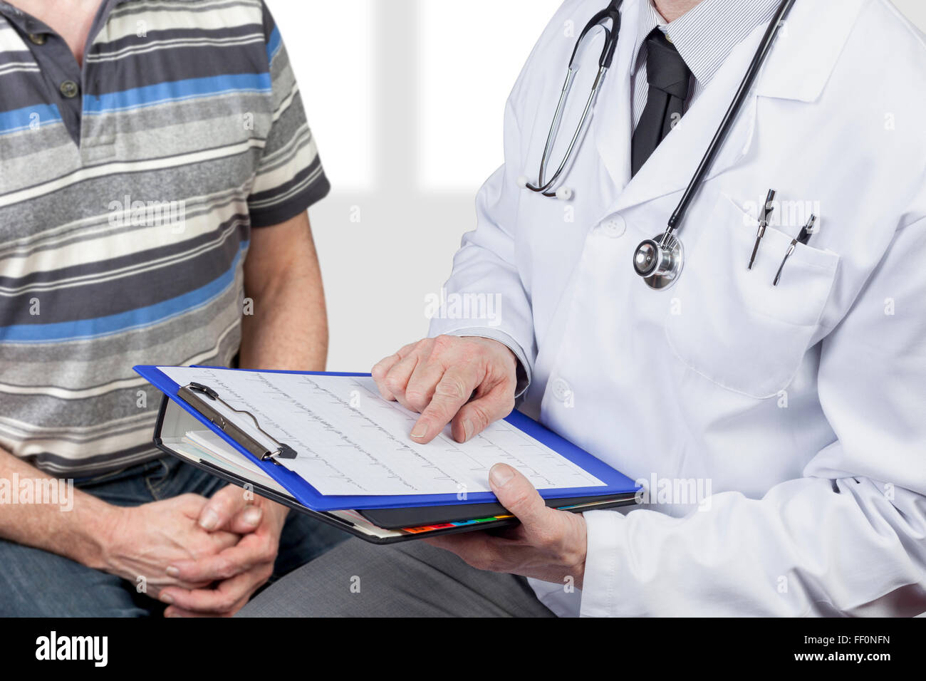 Doctor wearing stethoscope hi-res stock photography and images - Alamy
