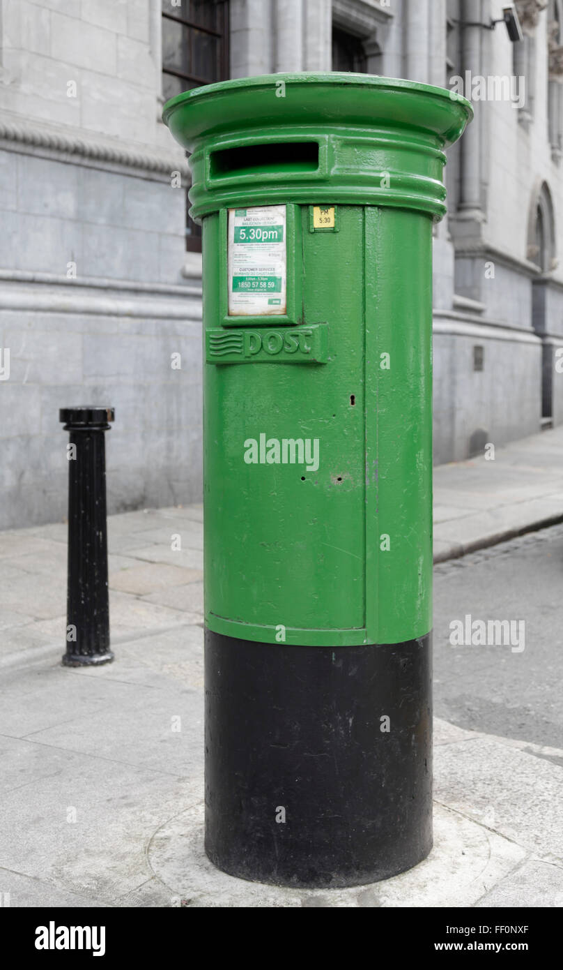 A green An Post postbox on Dame Street in central Dublin, Republic of Ireland. Stock Photo