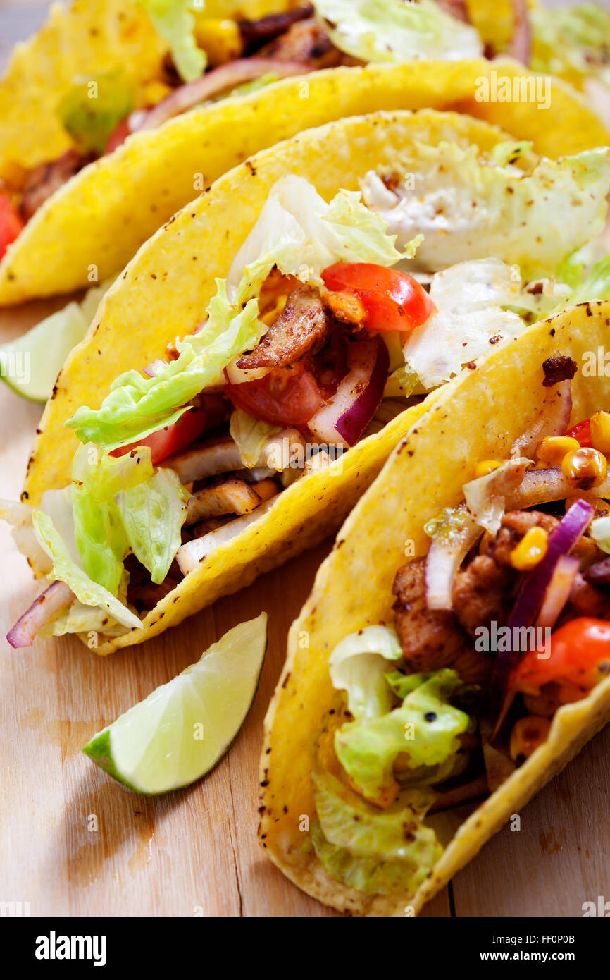 Fresh Mexican tacos with spicy chicken Stock Photo