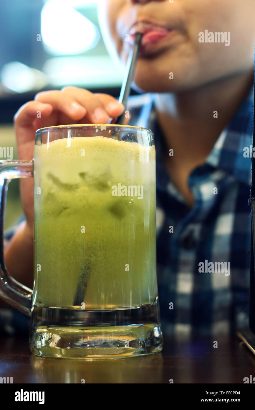 A child drinking freshly squeezed apple juice Stock Photo Alamy