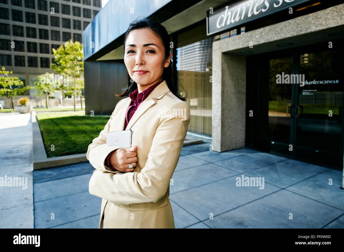 Businesswoman posing confidence arms hi-res stock photography and ...