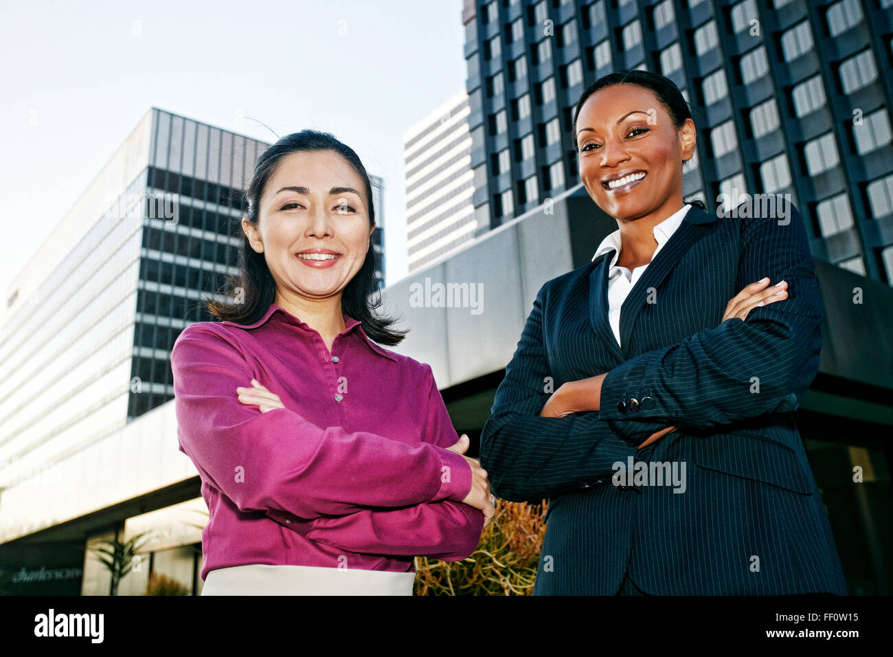 Businesswomen smiling hi-res stock photography and images - Alamy