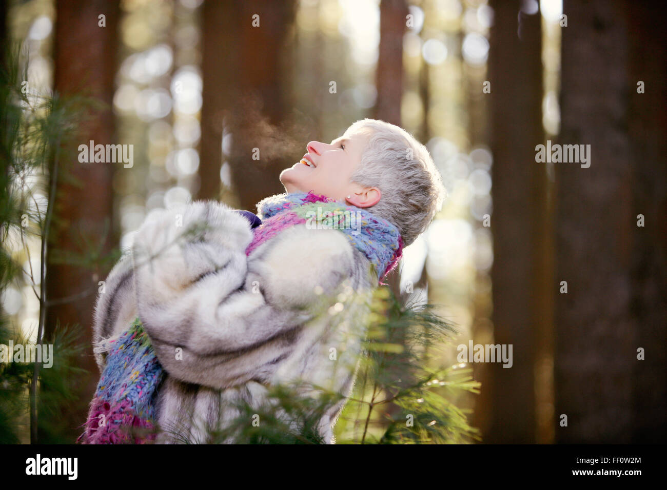 Older Caucasian woman standing outdoors Stock Photo