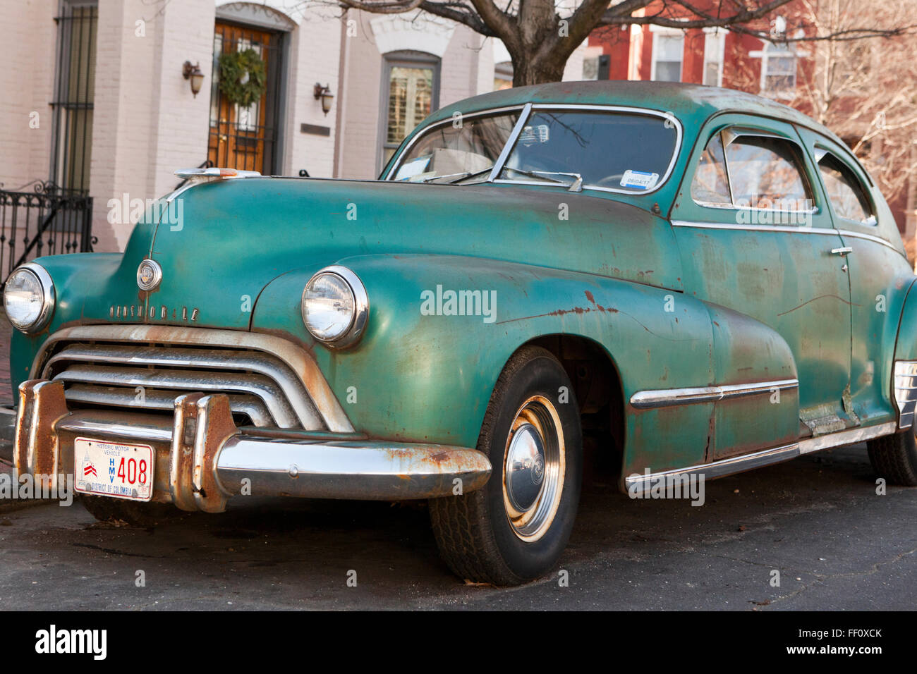 Vintage 1948 Oldsmobile Coupe 66 2-door car (rusty old car) - USA Stock Photo