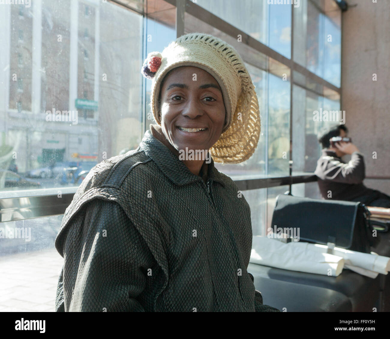 African-American woman wearing rasta hat - USA Stock Photo