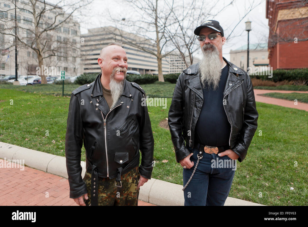 Middle aged Caucasian men wearing leather jackets and gray beards - USA Stock Photo