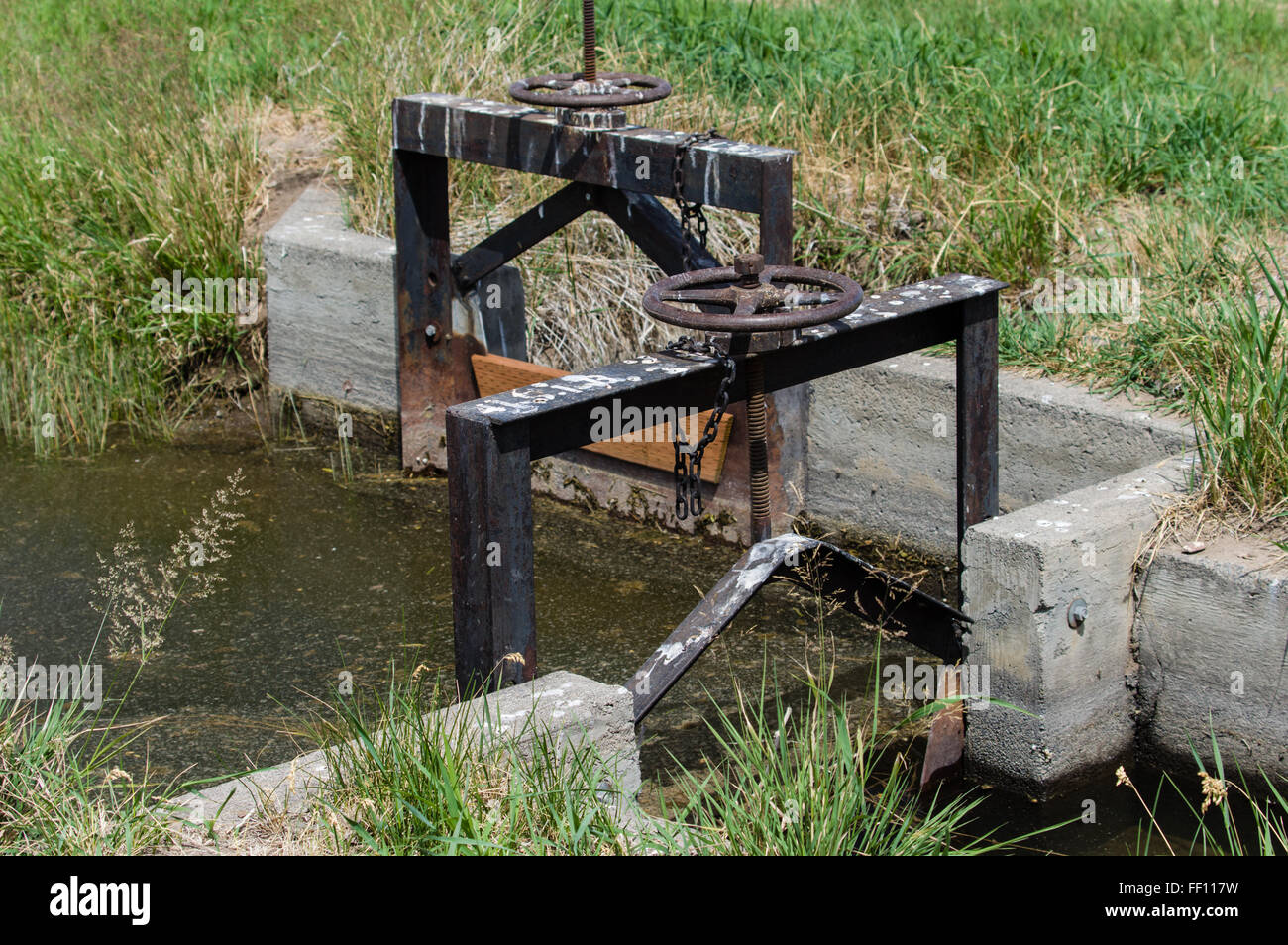 Irrigation canal gates or valves to regulate the flow of water into
