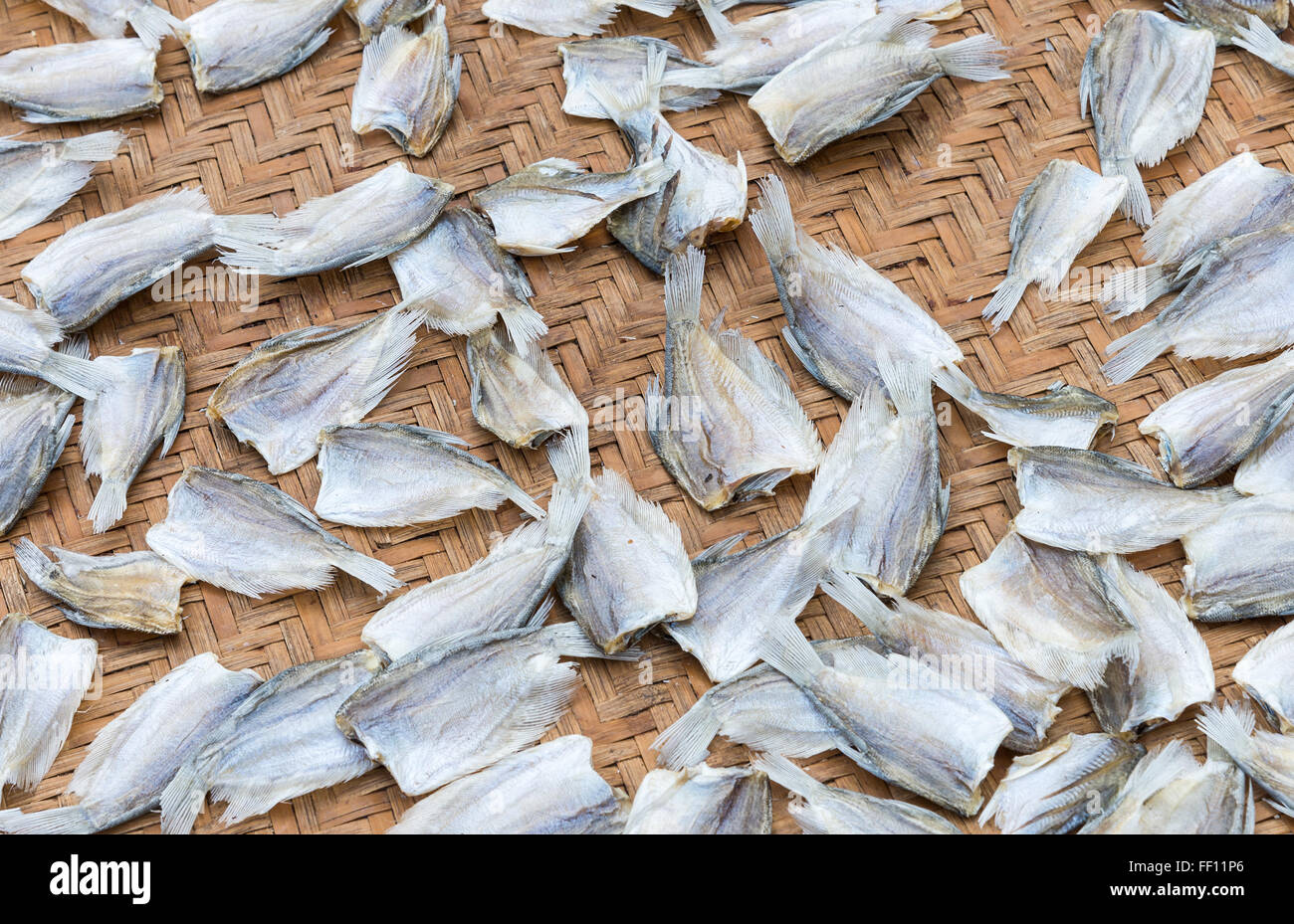 Dried fish group on the bamboo basket Stock Photo Alamy