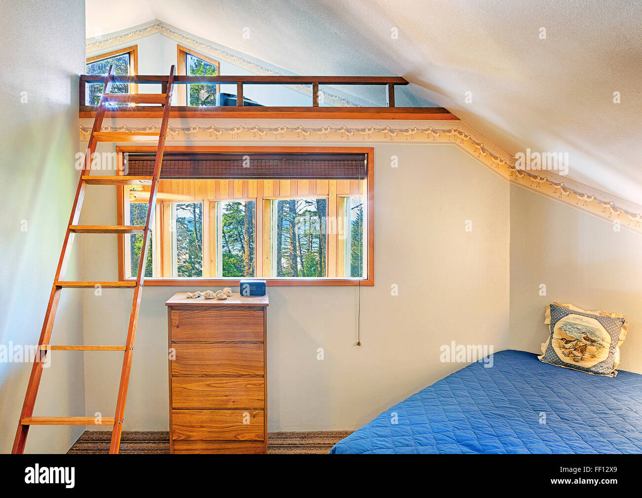 Loft bed in modern bedroom Stock Photo