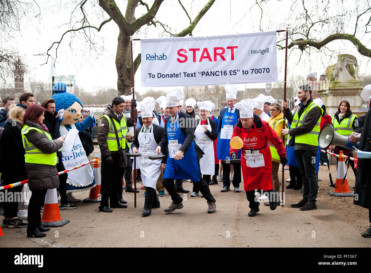 Westminster, London, United Kingdom. February 9th, 2016 -  The annual Parliamentary pancake race in Victoria Gardens, Westminster. Members of the Lords, MPs and the media participates in the race. Credit:  Dinendra Haria/Alamy Live News Stock Photo