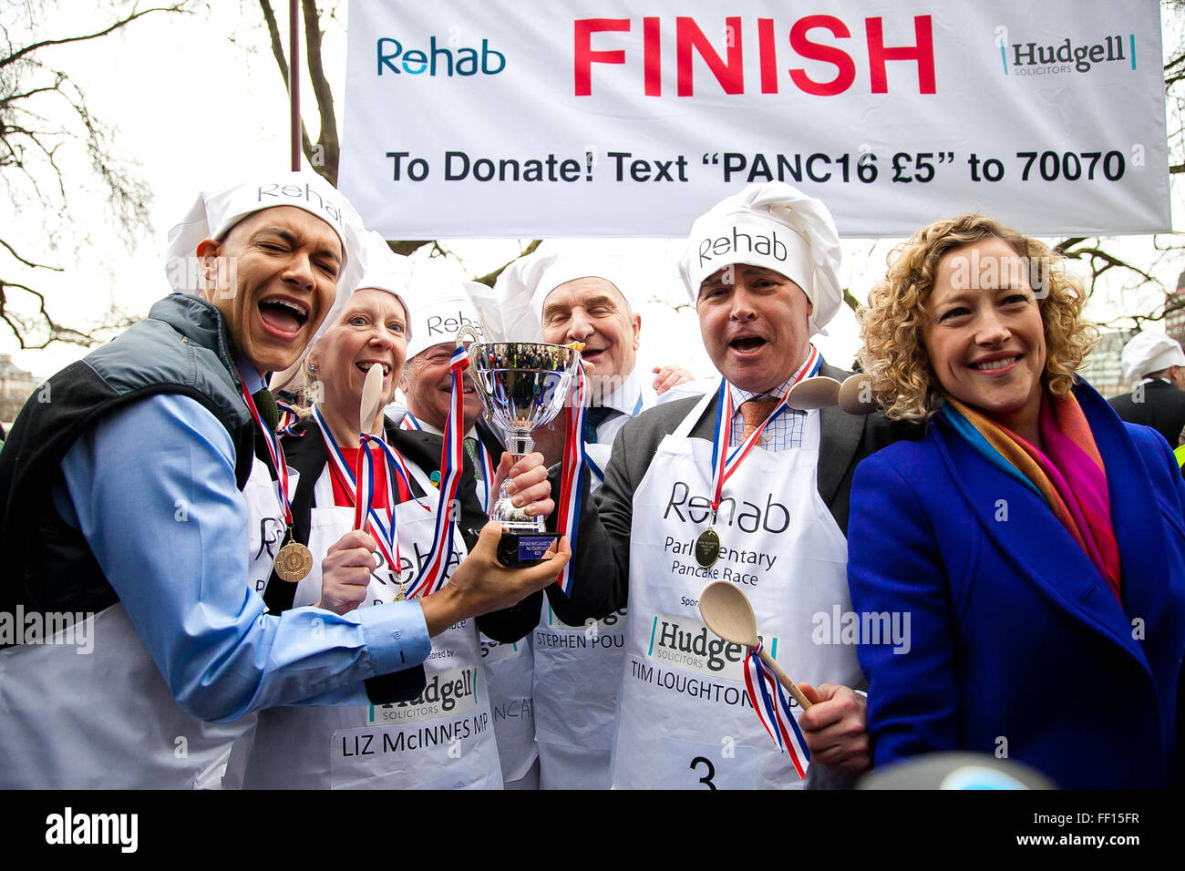 Westminster, London, United Kingdom. February 9th, 2016 -  MP's win the annual Parliamentary pancake race in the aid of the disability charity Rehab and pose for photos Credit:  Dinendra Haria/Alamy Live News Stock Photo