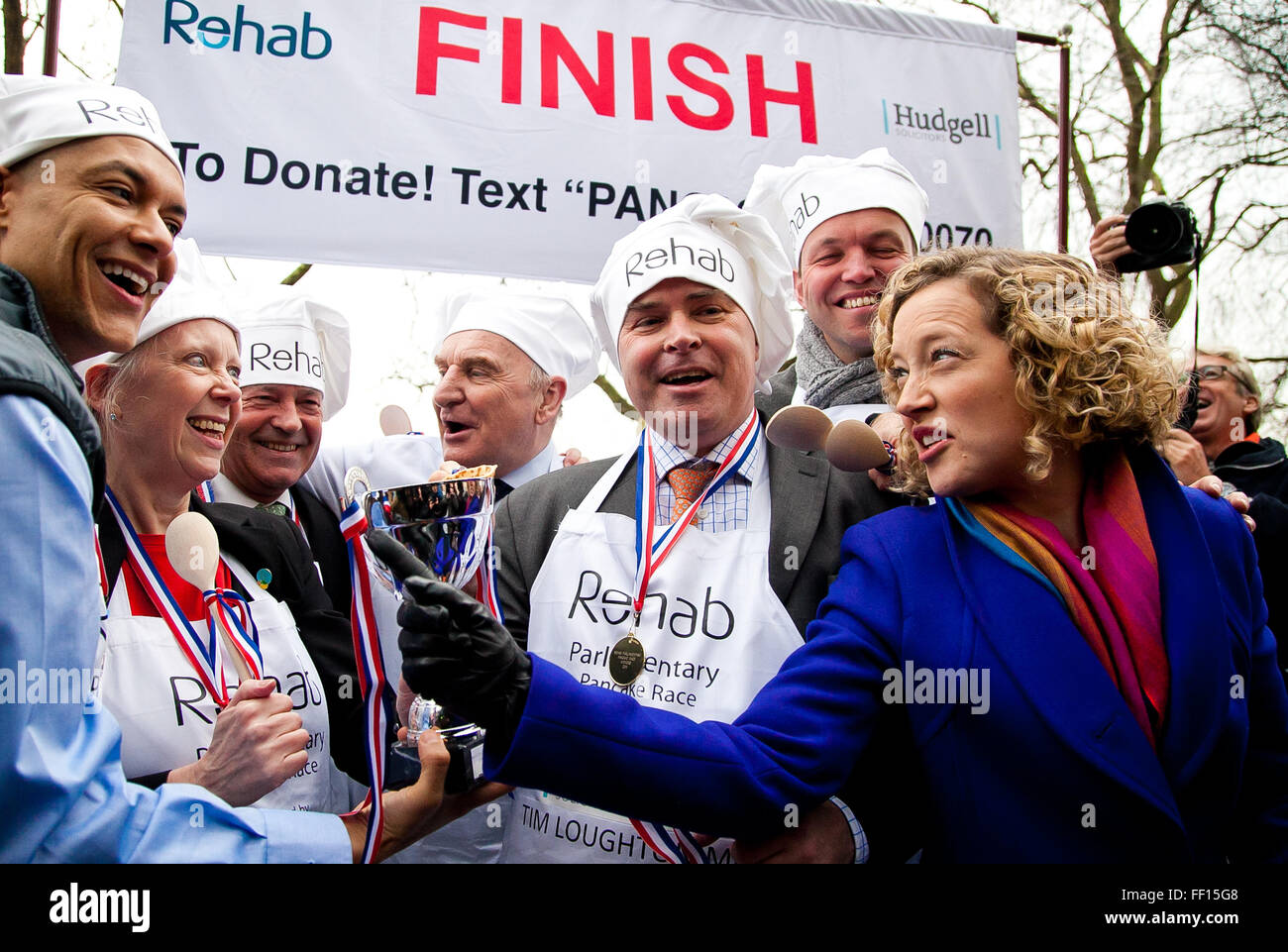 Westminster, London, United Kingdom. February 9th, 2016 -  MP's win the annual Parliamentary pancake race in the aid of the disability charity Rehab and pose for photos Credit:  Dinendra Haria/Alamy Live News Stock Photo