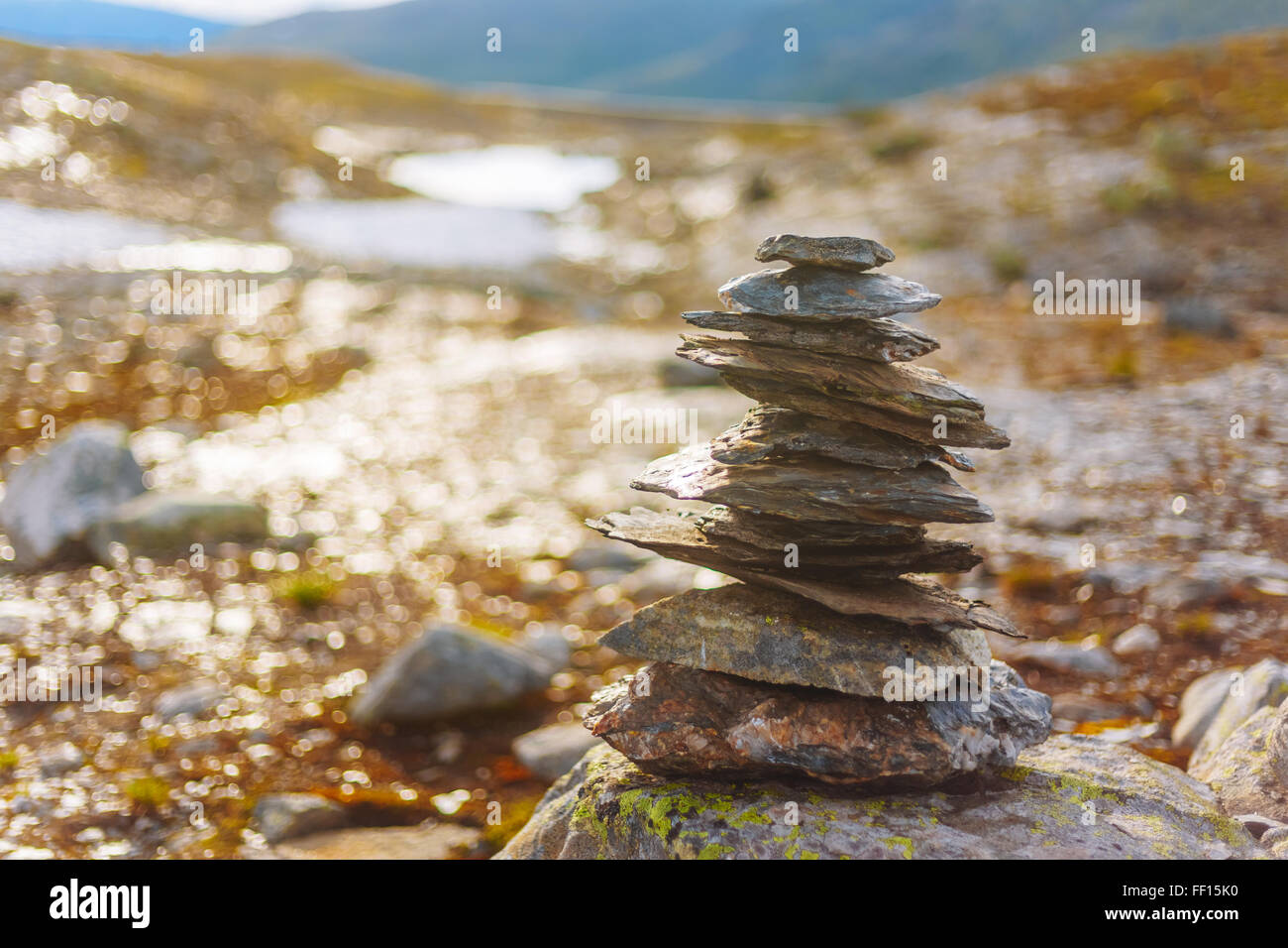 Stack Of Rocks Stones On Norwegian Mountain, Norway Nature. Toned Instant Photo Stock Photo