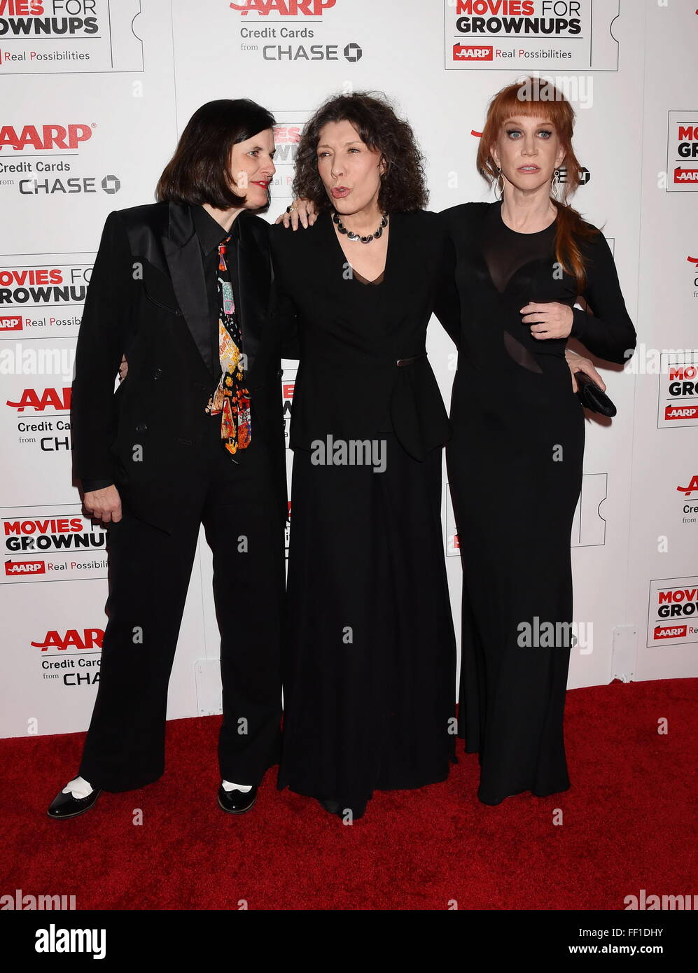 BEVERLY HILLS, CA - FEBRUARY 08: (L-R) Actresses/comediennes Paula Poundstone, Lily Tomlin and host Kathy Griffin attend AARP's Movie For GrownUps Awards at the Regent Beverly Wilshire Four Seasons Hotel on February 8, 2016 in Beverly Hills, California. Stock Photo