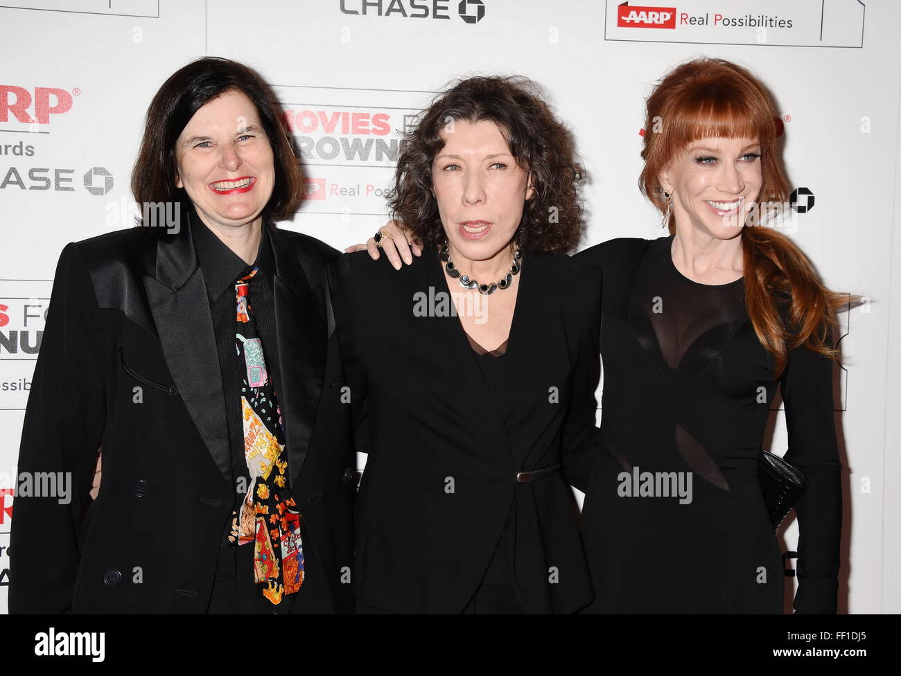 BEVERLY HILLS, CA - FEBRUARY 08: (L-R) Actresses/comediennes Paula Poundstone, Lily Tomlin and host Kathy Griffin attend AARP's Movie For GrownUps Awards at the Regent Beverly Wilshire Four Seasons Hotel on February 8, 2016 in Beverly Hills, California. Stock Photo