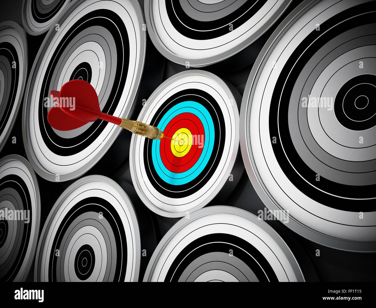 Red Dart hit right at the middle of the small target. Niche marketing concept which means concentrating all marketing efforts on Stock Photo