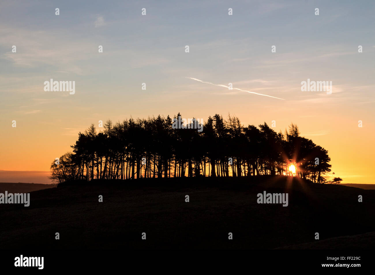 Teesdale, County Durham. Wednesday 10th February 2016, UK Weather.  Clear skies this morning meant it was a cold start to the day as the sun rose over the ancient burial mound of Kirkcarrion in the North Pennines. Credit:  David Forster/Alamy Live News Stock Photo