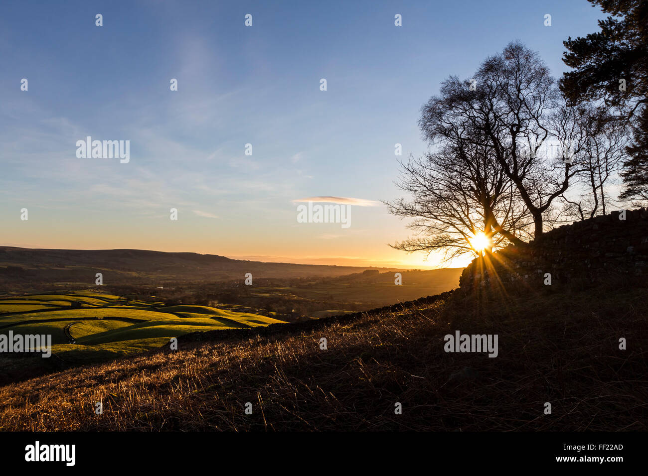 Teesdale, County Durham. Wednesday 10th February 2016, UK Weather.  Clear skies this morning meant it was a cold start to the day as the sun rose over the ancient burial mound of Kirkcarrion in the North Pennines. Credit:  David Forster/Alamy Live News Stock Photo