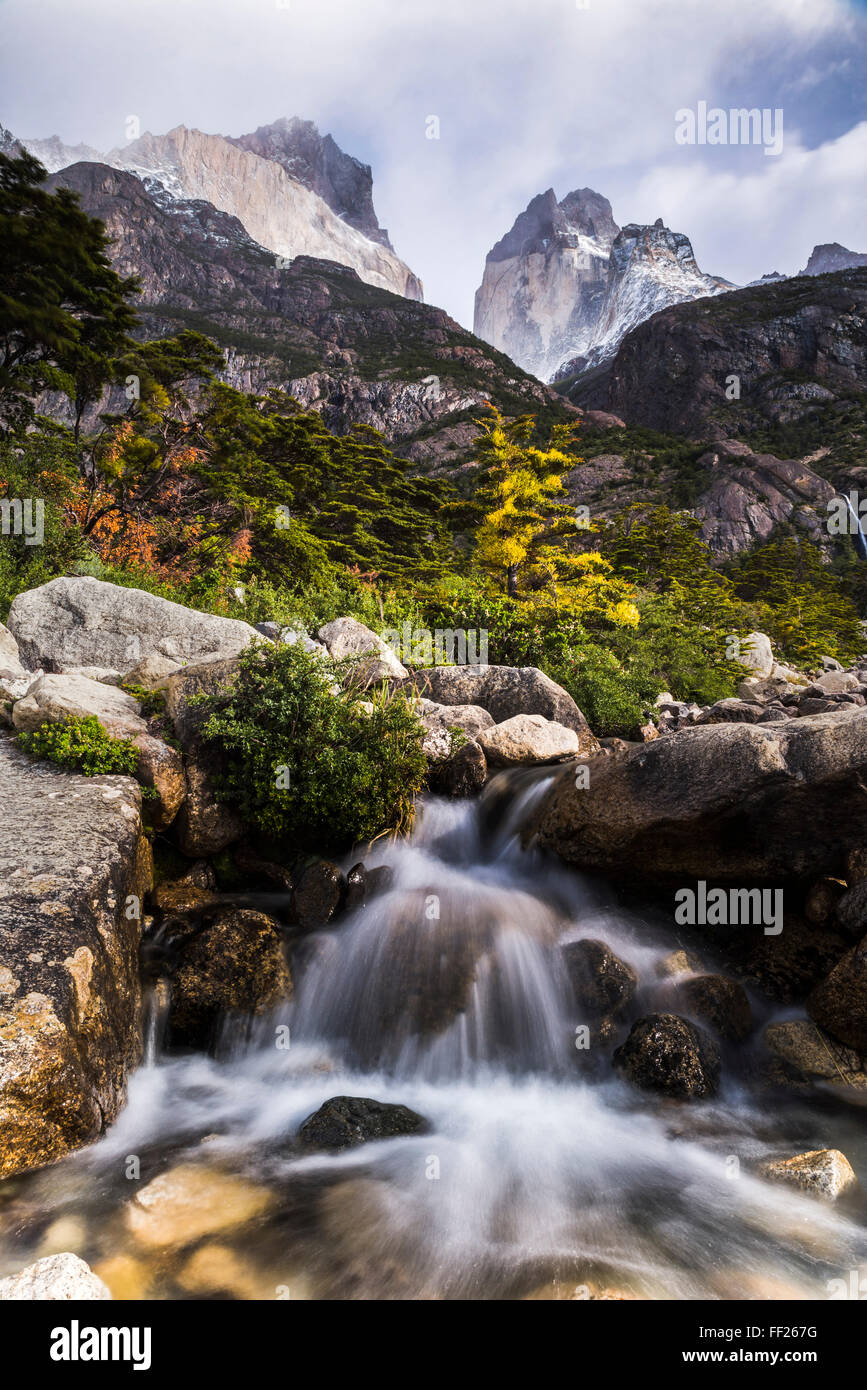 RMos Cuernos and a waterfaRMRM in Torres deRM Paine NationaRM Park (Parque NacionaRM Torres deRM Paine), Patagonia, ChiRMe Stock Photo