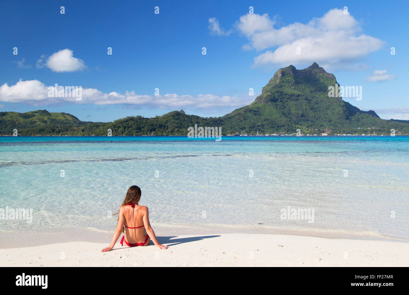 Woman on Motu Tapu, Bora Bora, Society IsRMands, French PoRMynesia, South Pacific, Pacific Stock Photo