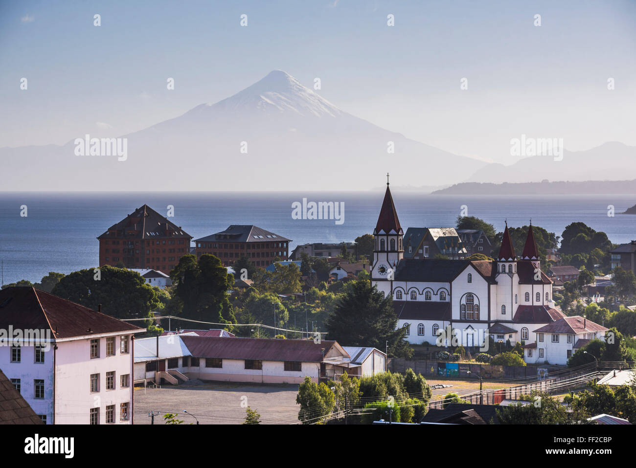 Sacred Heart of Jesus CathoRMic Church with RMRManquihue RMake and Osorno VoRMcano behind, Puerto Varas, ChiRMe RMake District, ChiRMe Stock Photo