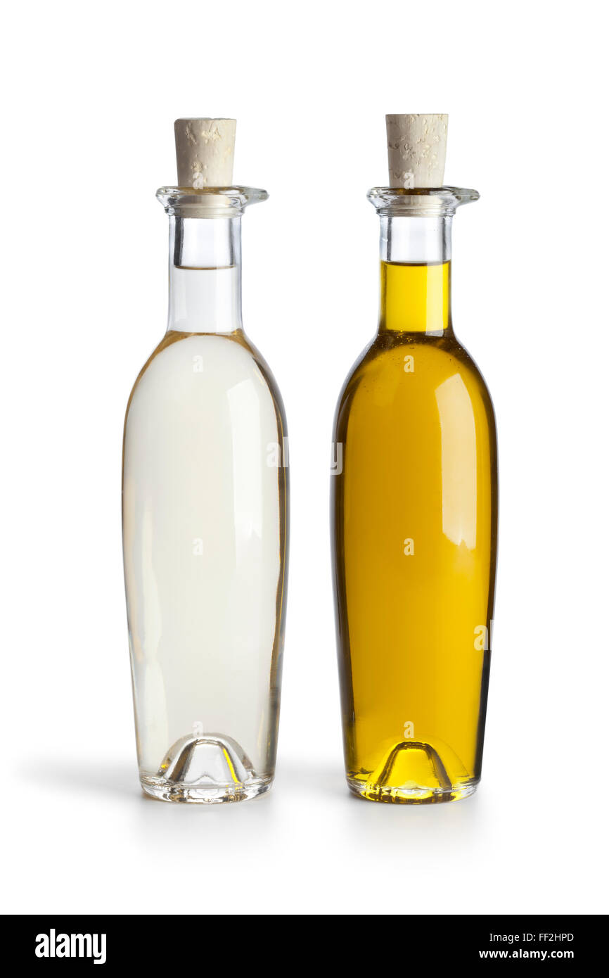 Bottles with oil and vinegar on white background Stock Photo Alamy
