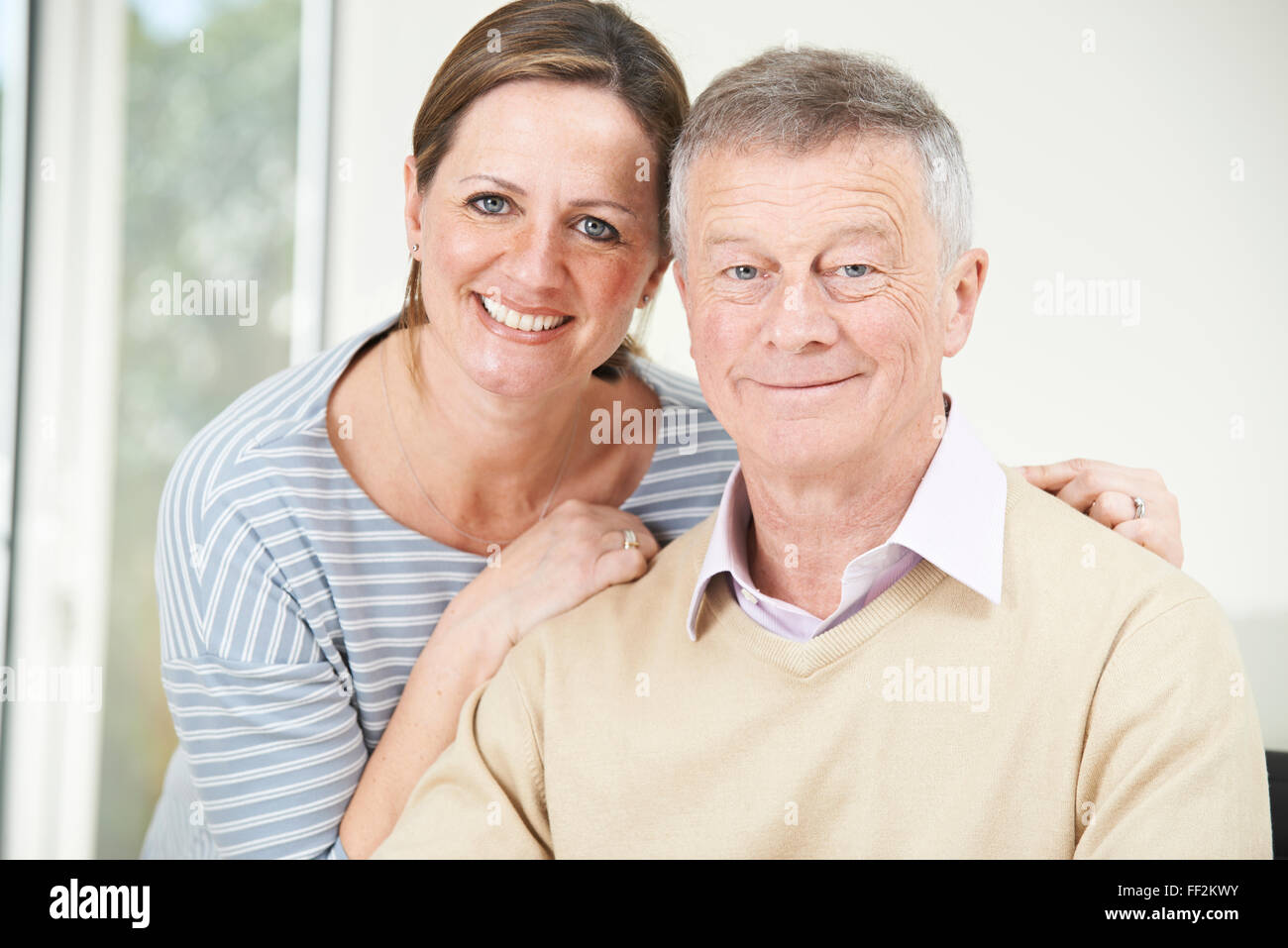 Portrait Of Senior Man With Adult Daughter Stock Photo