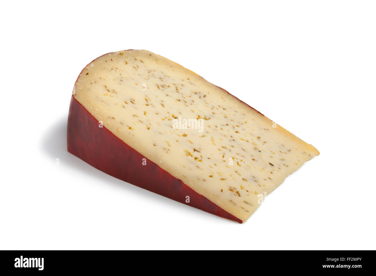 Portion Farmers Leiden cumin cheese on white background Stock Photo