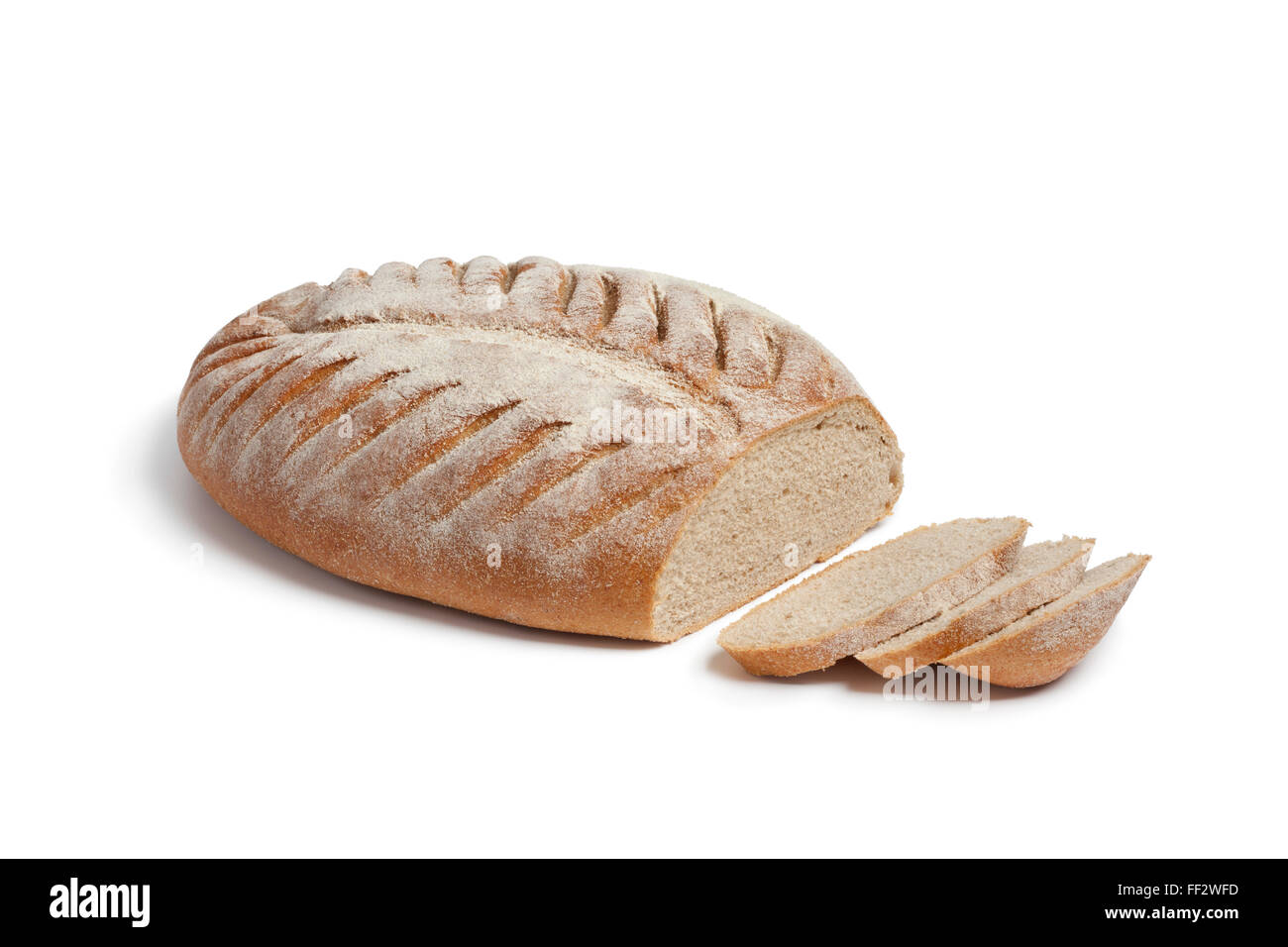 Loaf of French farmers bread with slices on white background Stock Photo