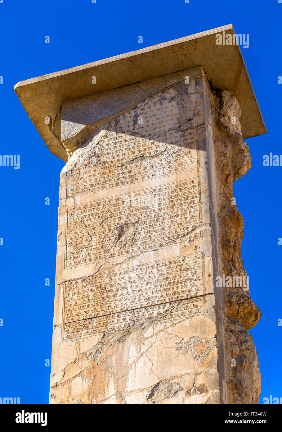 Ancient script on a column in Persepolis, Iran Stock Photo
