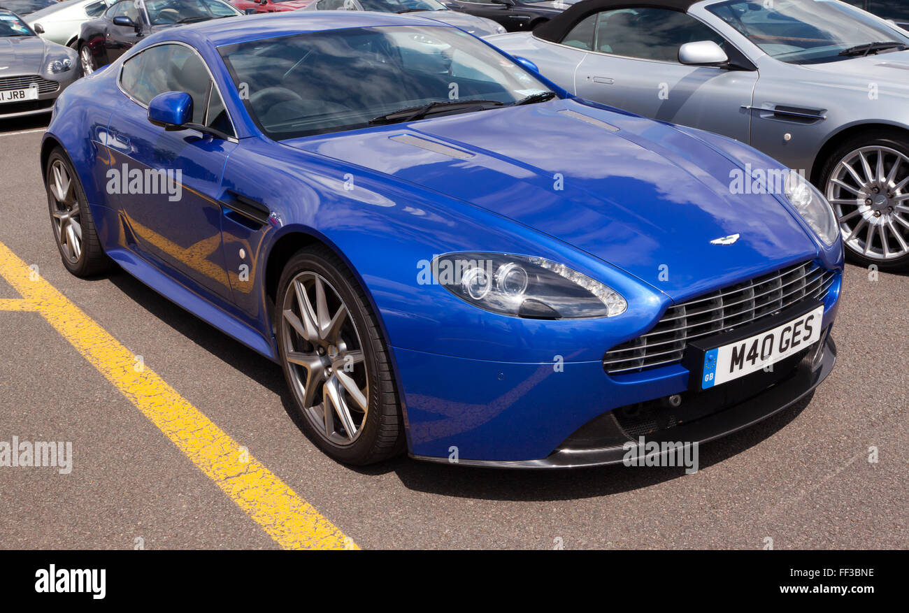 A blue,  2011, Aston Martin V8 Vantage S,  on static display, at the Silverstone Classic 2015. Stock Photo