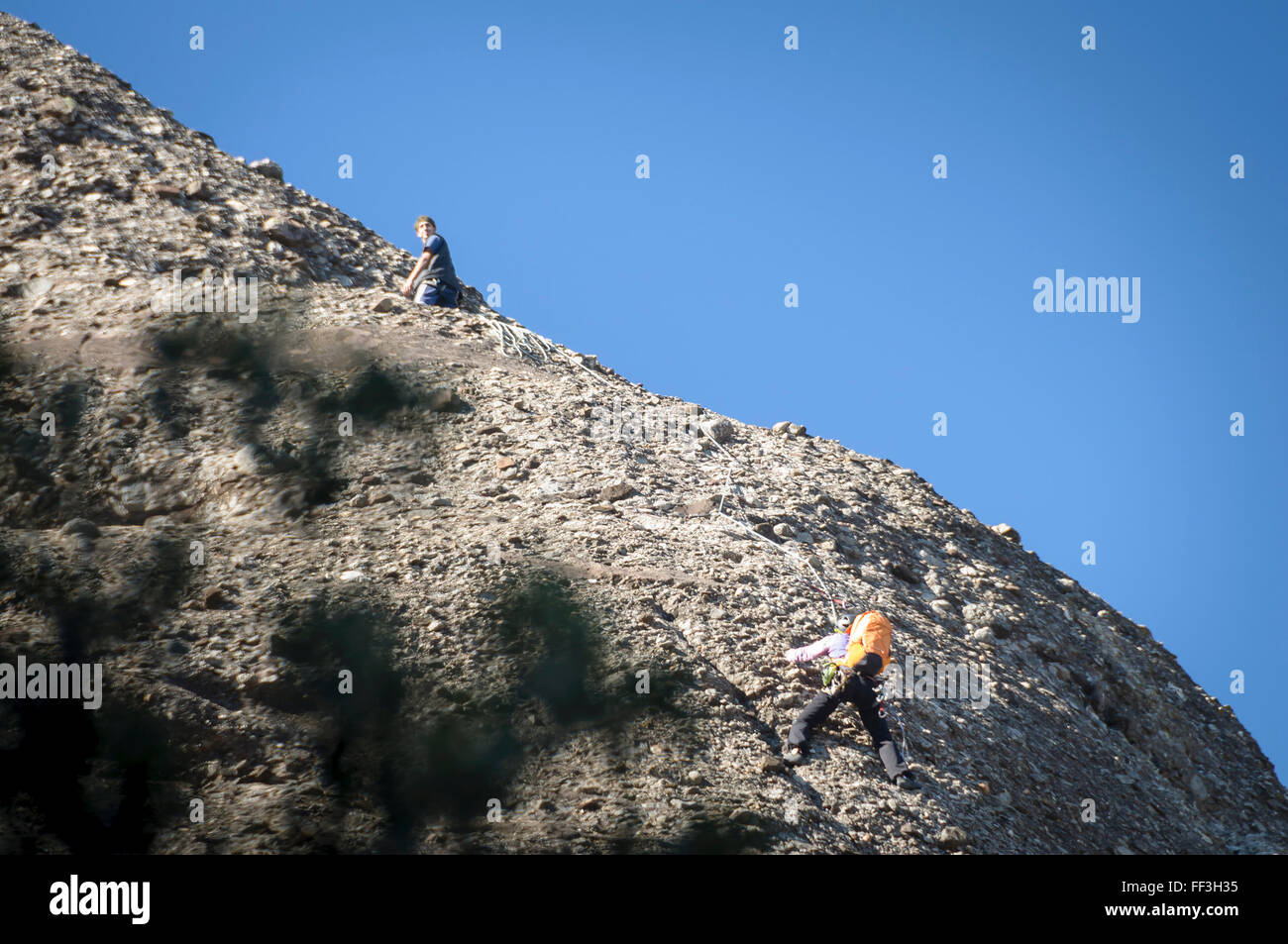 Two people climbing in Montserrat , Barcelona, Catalonia , Spain Stock Photo