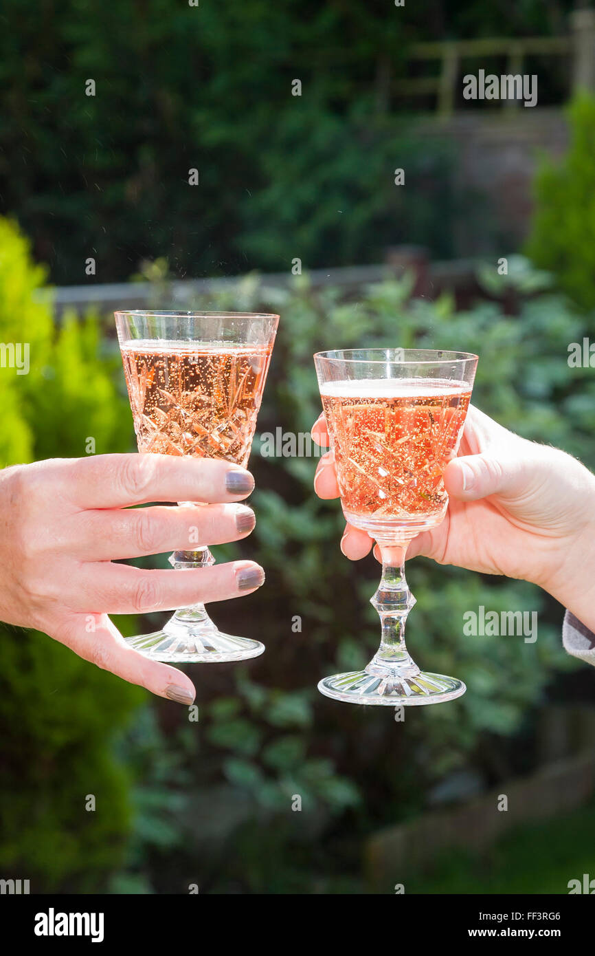 Two hands hold of the glass Stock Photo