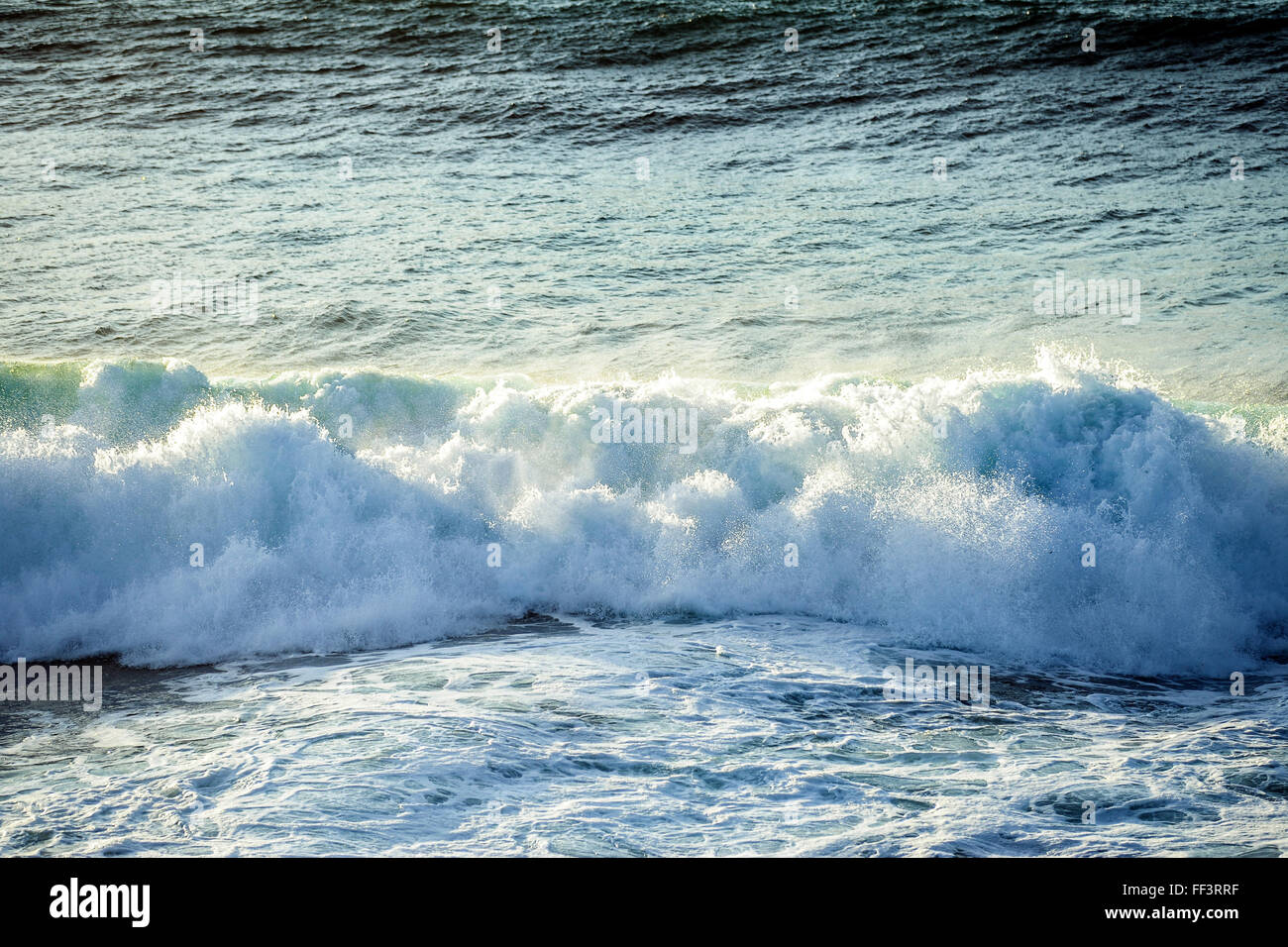 Crushing wave in ocean at Fingal Heads, Gold Coast Hinterland Stock Photo