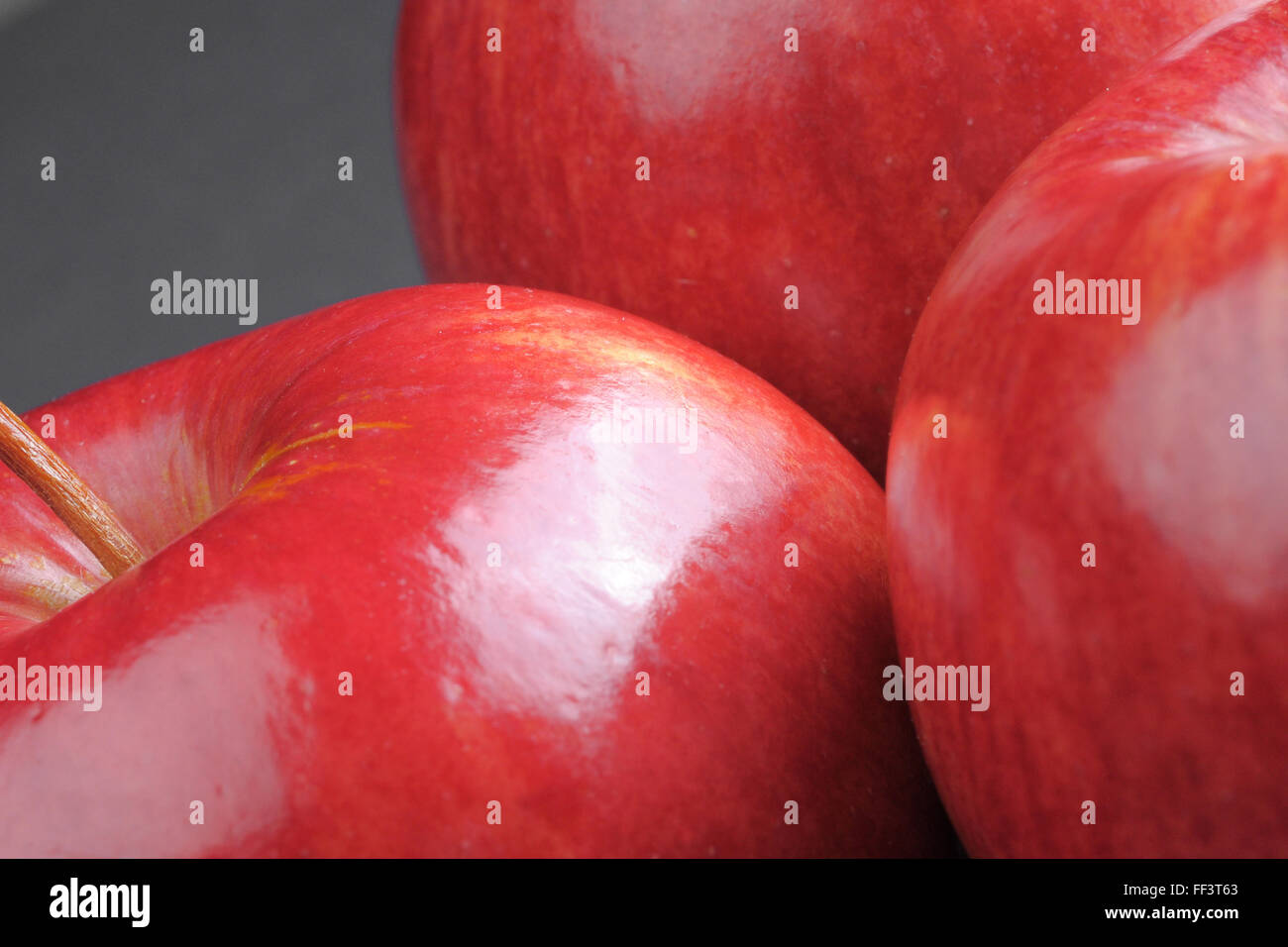 Red apples on white and black background Stock Photo