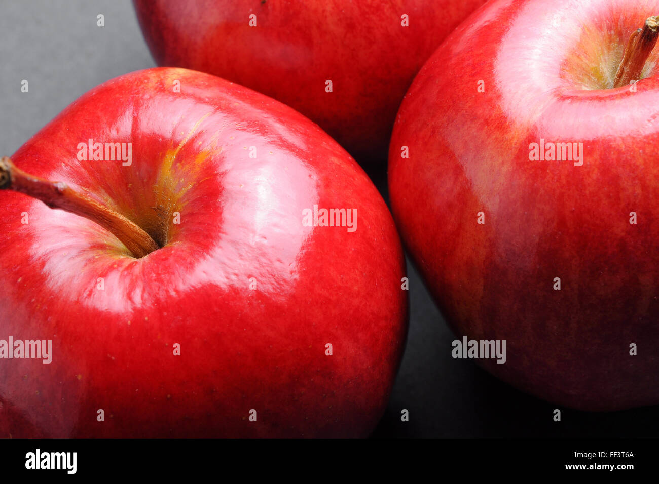 Red apples on white and black background Stock Photo
