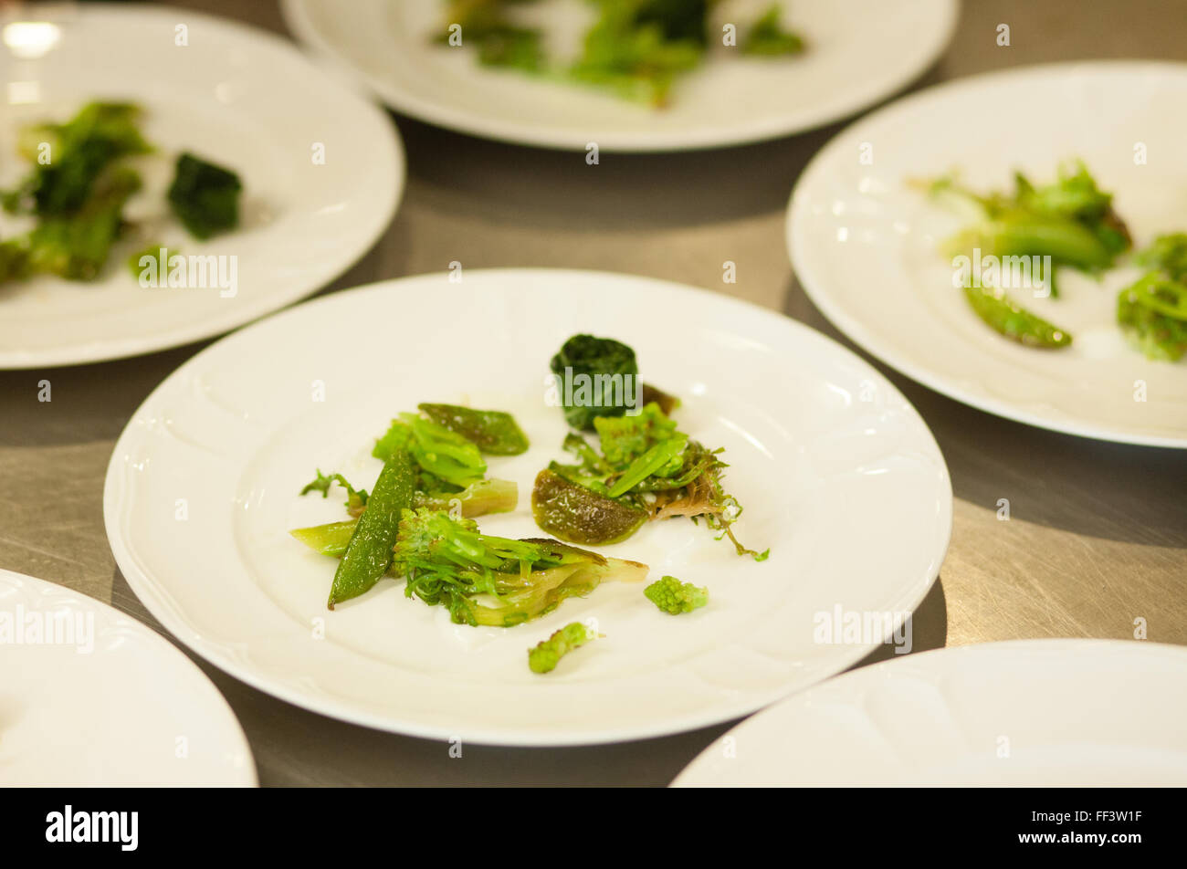 Plated salads in a fine dining restaurant Stock Photo