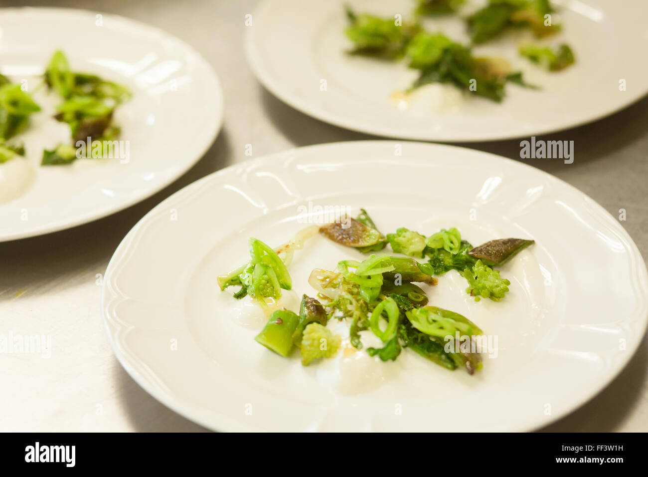 Plated salads in a fine dining restaurant Stock Photo