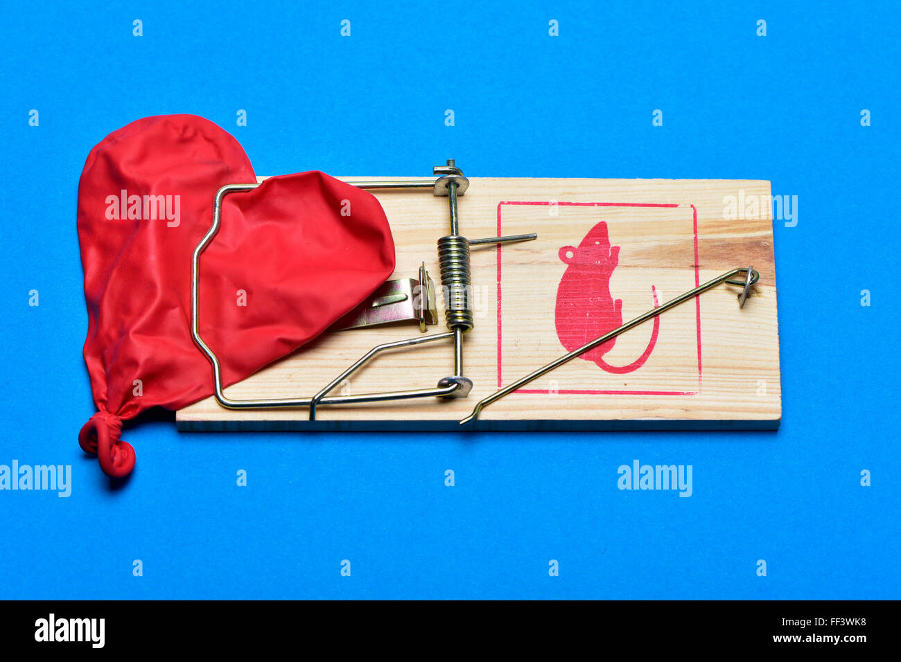 Heart caught in mousetrap hi-res stock photography and images - Alamy
