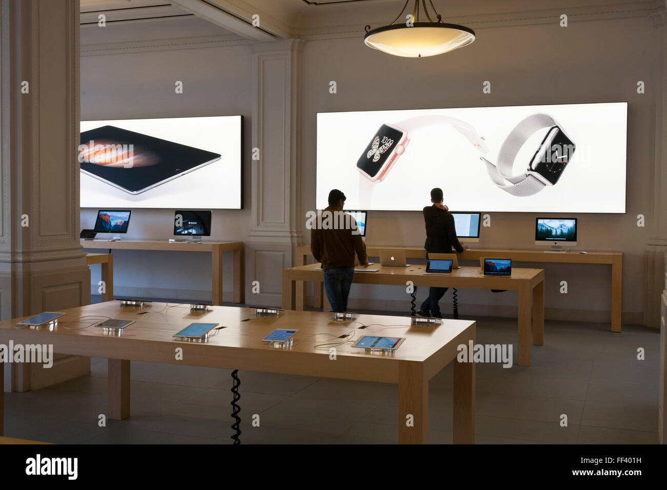 An Apple Store with People Waiting To Purchase Apple Macbooks, IPads and  IPhones Editorial Image - Image of designs, ecosystem: 168250490