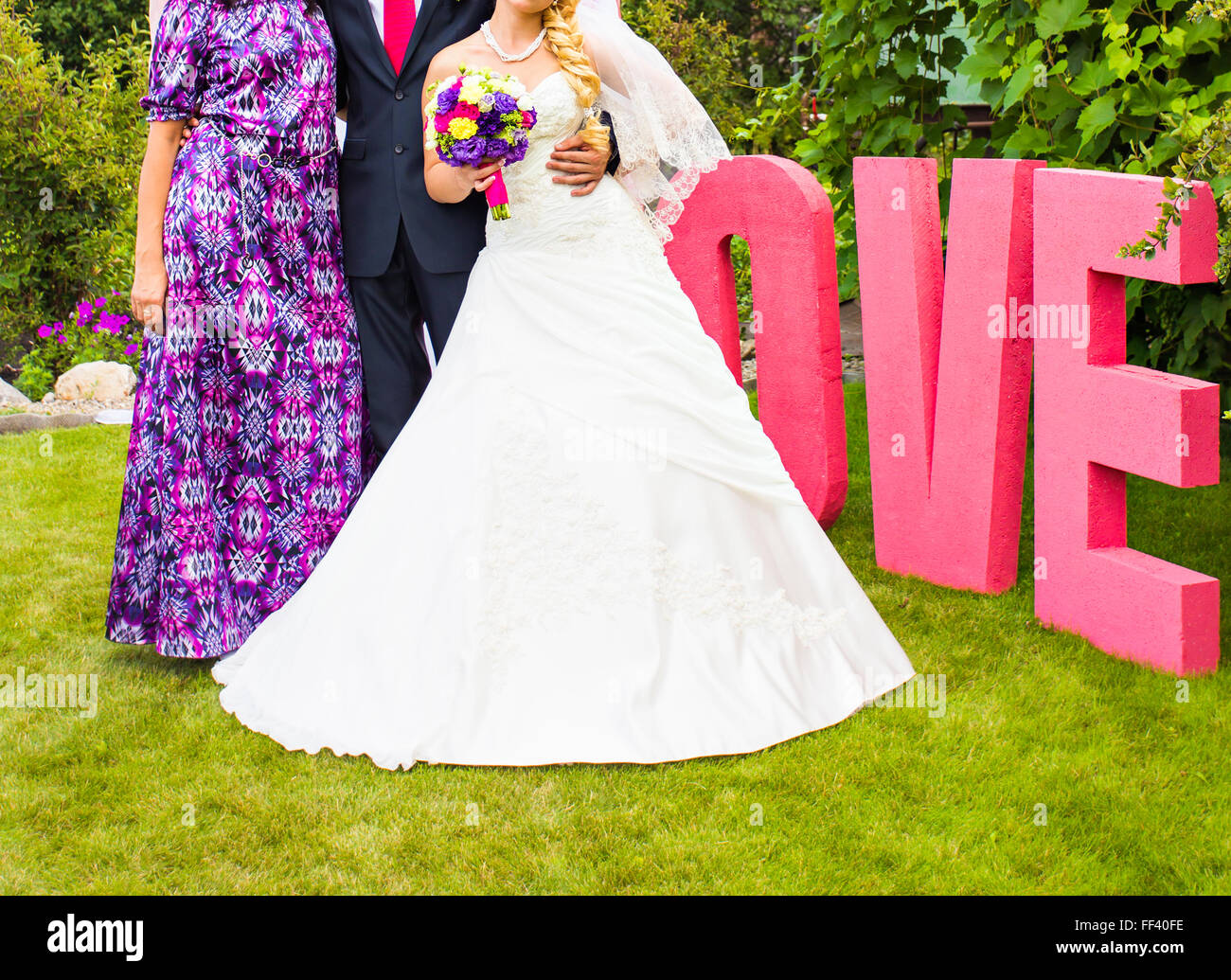 The bride and groom, and guests Stock Photo Alamy