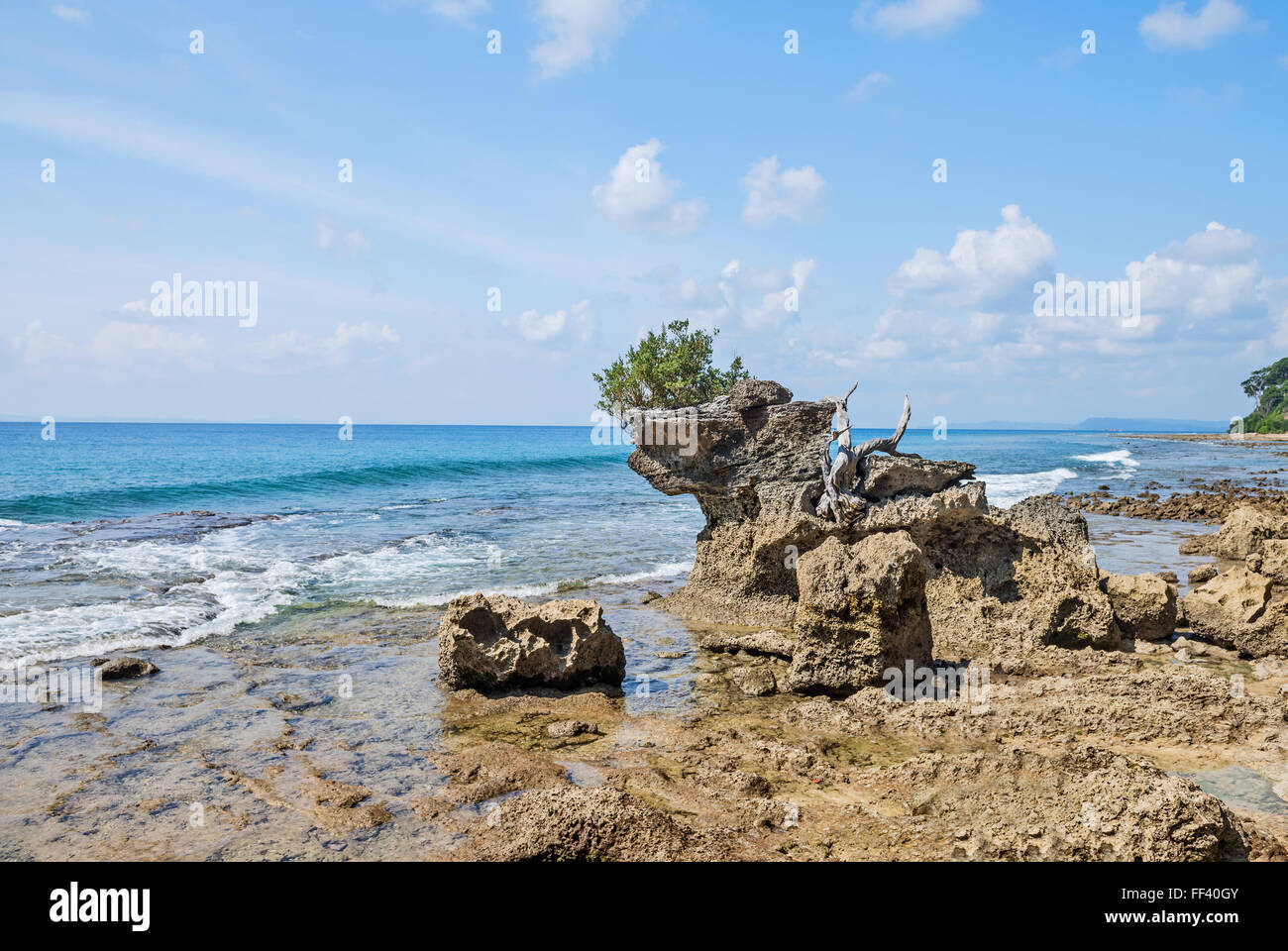 Rock projecting at sea shore in Neil Island, Andaman and Nicobar, India Stock Photo