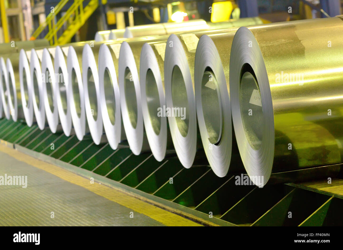 rolled steel coils inside of steel plant Stock Photo