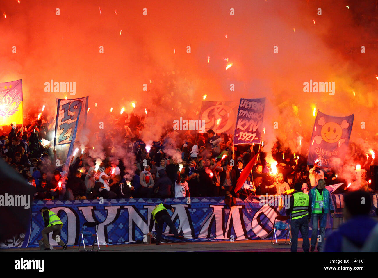 FC Dynamo Kyiv ultras (ultra supporters) burn flares during Ukraine Championship game against Shakhtar Donetsk Stock Photo