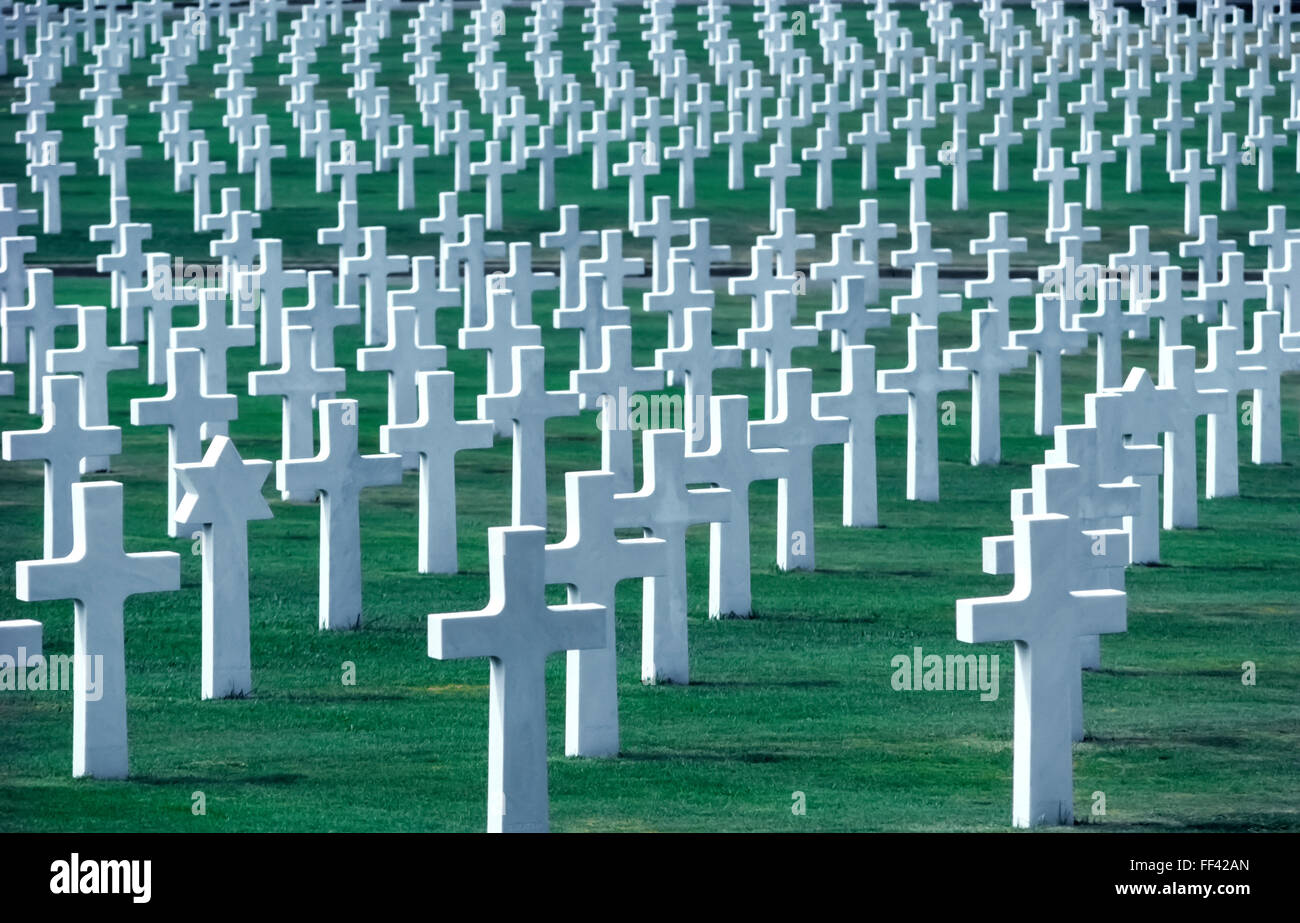 These white marble crosses and Stars of David at the Manila American Cemetery and Memorial in the Philippines are some of the 17,097 headstones marking the burial sites of members of U.S. Forces who died during World War II in Southeast Asia. Stock Photo